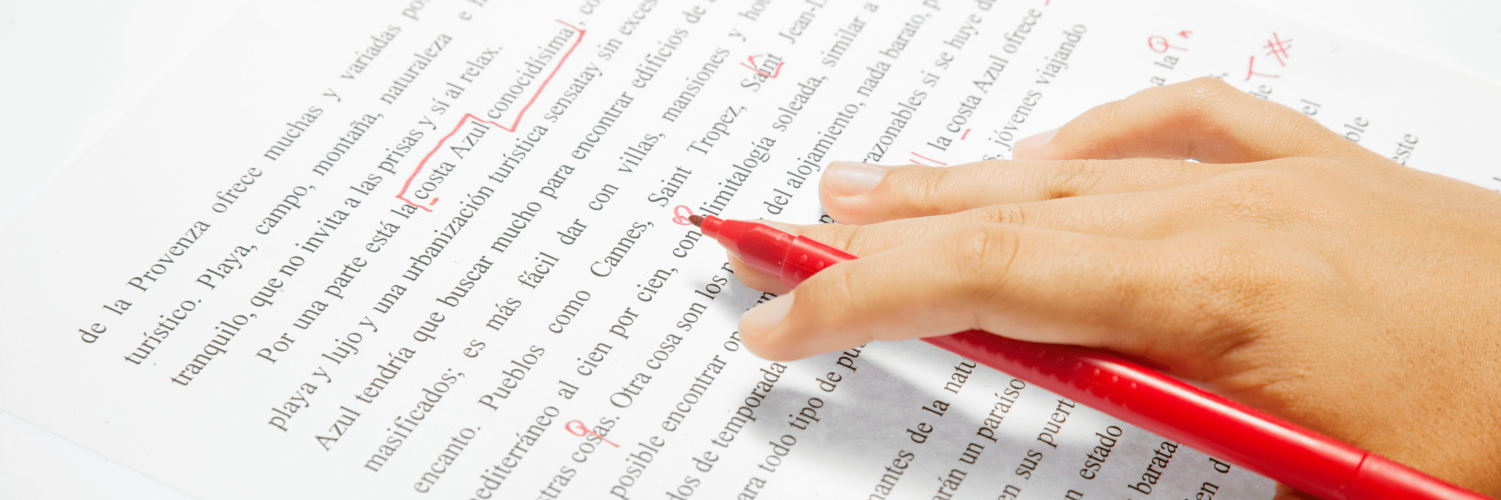 Person editing a multilingual document to enhance accuracy and quality of language.