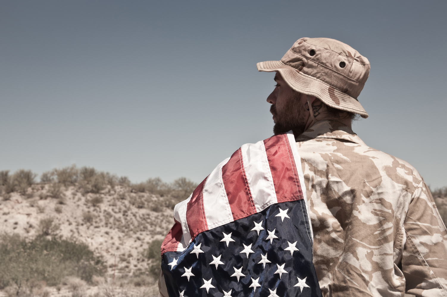 Military Veteran with the United States Flag